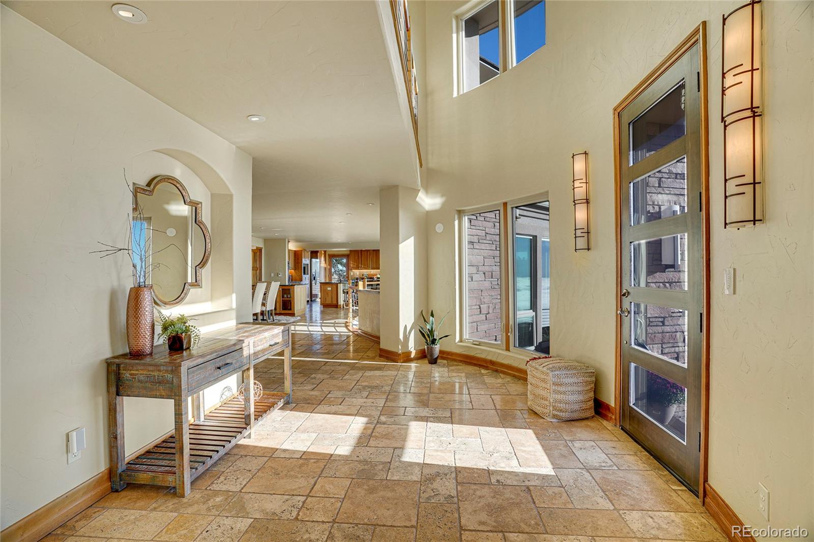 6057 Red Hill Road Boulder, CO 80302 - Photo 6 of 41 a lobby with furniture and a rug
