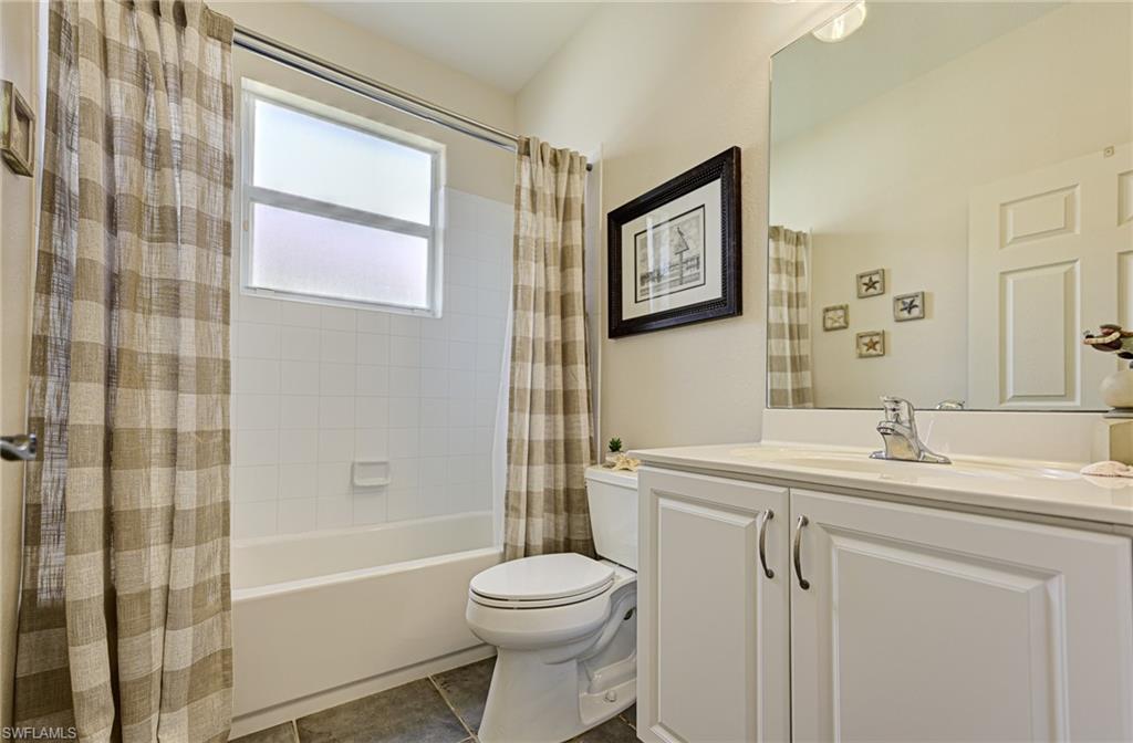 9290 Springview Loop Estero, FL 33928 - Photo 14 of 25 a bathroom with a sink toilet and shower