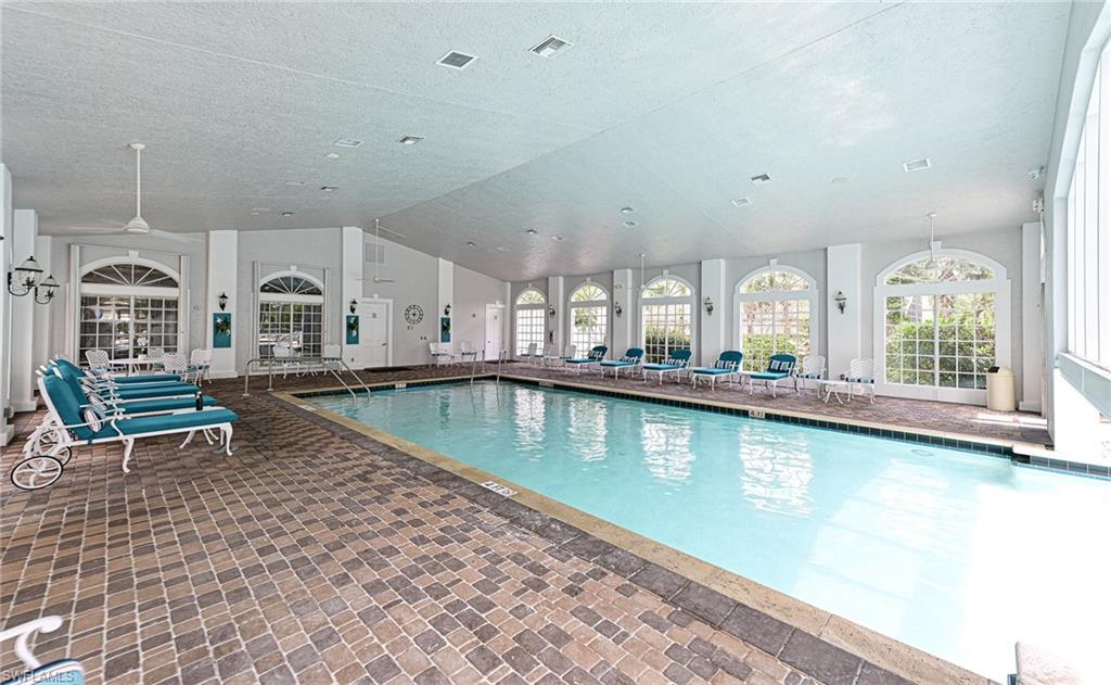 9290 Springview Loop Estero, FL 33928 - Photo 20 of 25 a view of a living room and kitchen view