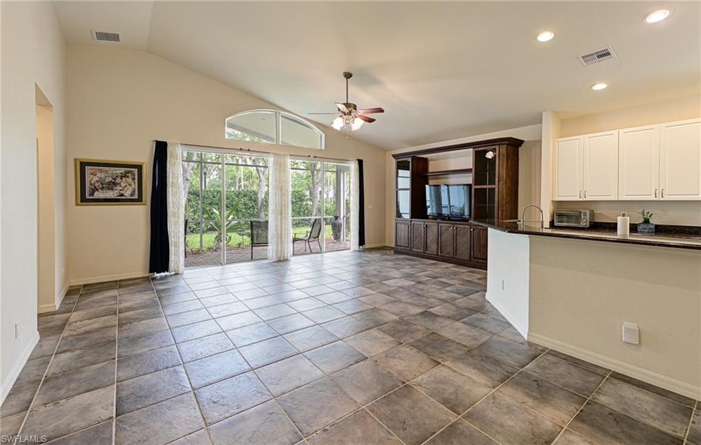9290 Springview Loop Estero, FL 33928 - Photo 2 of 25 a view of a kitchen with furniture and a window