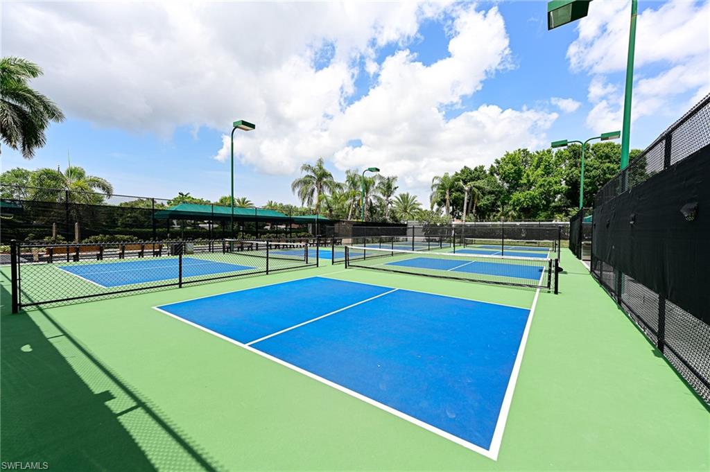 9290 Springview Loop Estero, FL 33928 - Photo 24 of 25 a view of an outdoor space and swimming pool