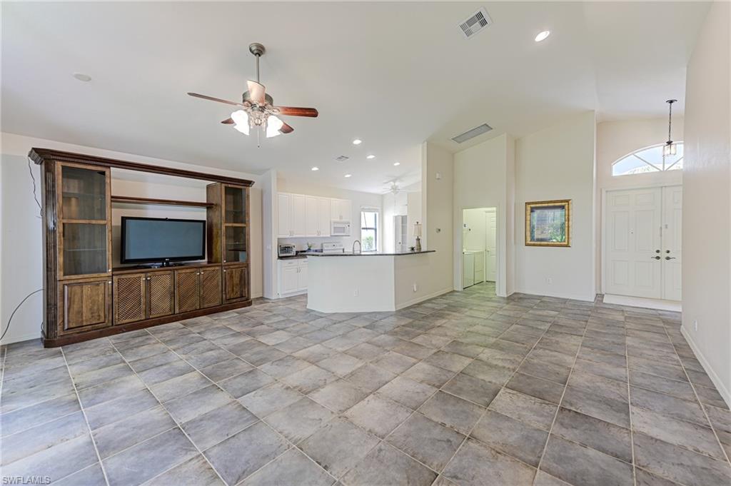 9290 Springview Loop Estero, FL 33928 - Photo 5 of 25 a view of a kitchen with a sink and a kitchen