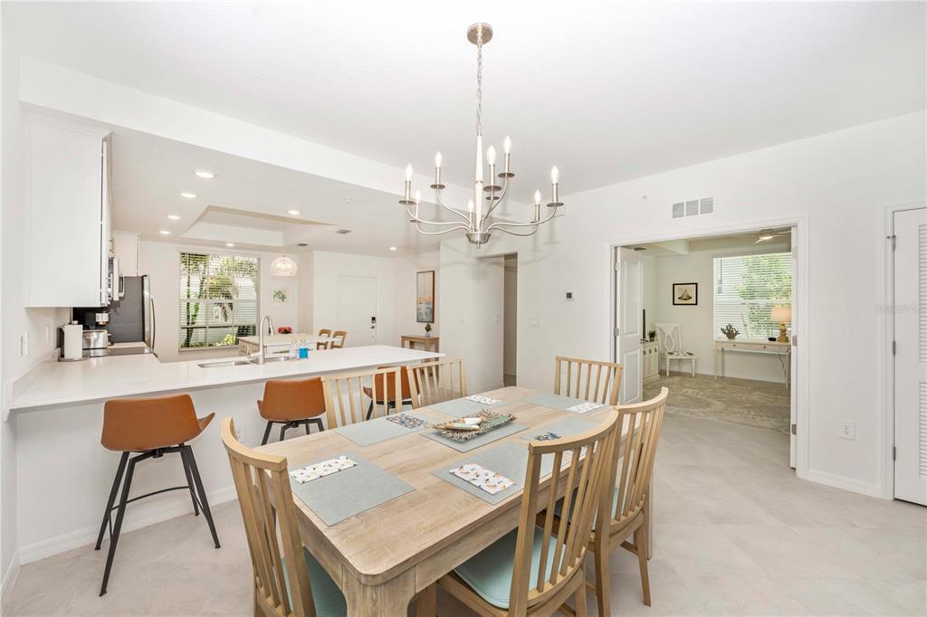 17500 Opal Sand Drive, Unit 101 Venice, FL 34293 - Photo 14 of 98 a view of a dining room and livingroom view