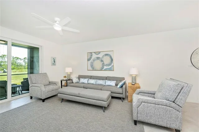 a bedroom with furniture and flat screen tv