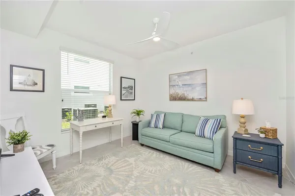 a bathroom with a double vanity sink mirror and shower