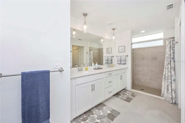 a front view of a house with yard and garage