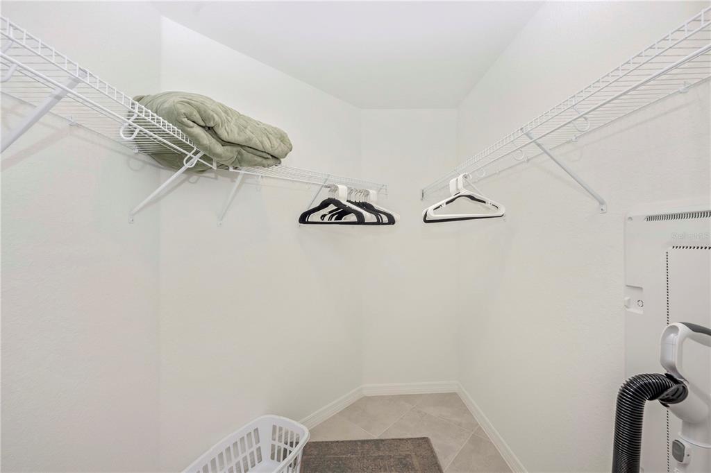 17500 Opal Sand Drive, Unit 101 Venice, FL 34293 - Photo 34 of 98 a view of small space with racks on the wall