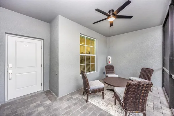 a view of a golf course with an ocean