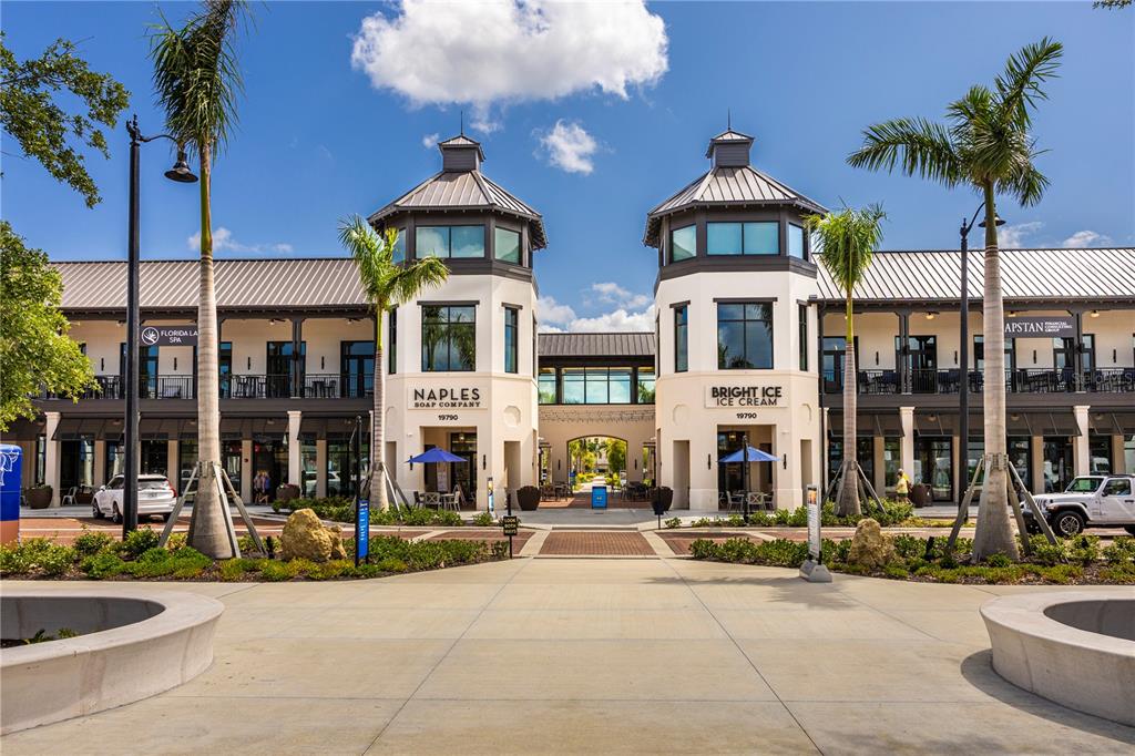 17500 Opal Sand Drive, Unit 101 Venice, FL 34293 - Photo 83 of 98 a front view of a building with street view