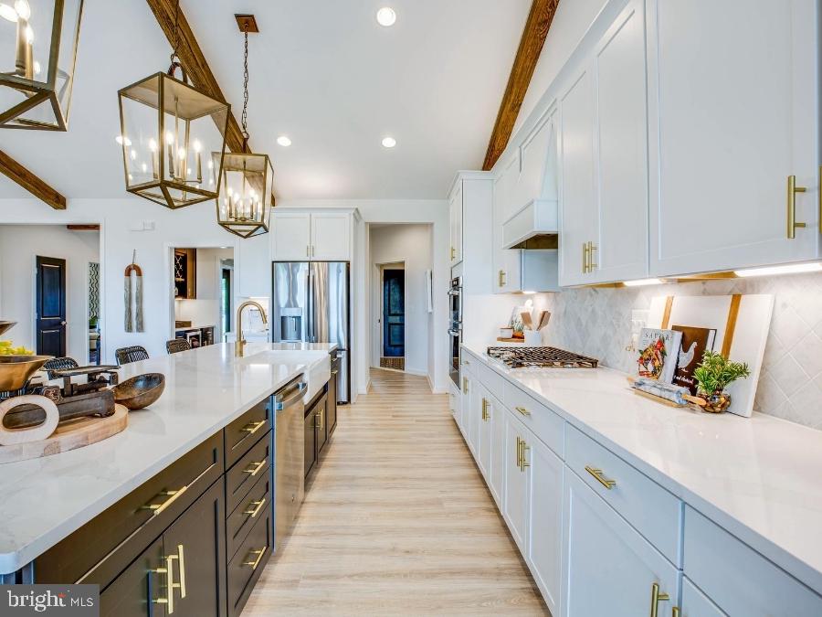 1 Spotswood Furnace Road Fredericksburg, VA 22407 - Photo 12 of 24 a large kitchen with stainless steel appliances lots of counter space and a sink