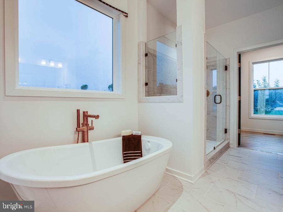 1 Spotswood Furnace Road Fredericksburg, VA 22407 - Photo 19 of 24 a bathroom with a bathtub and shower
