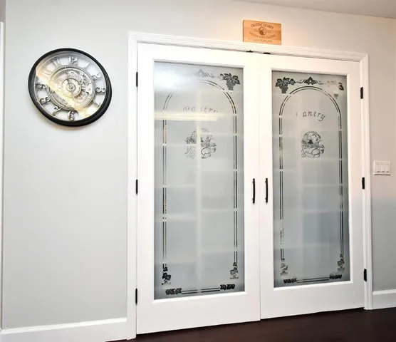 a workspace with furniture hardwood and a window