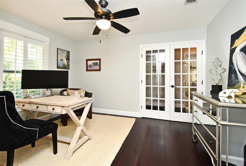 1312 2nd Street Edgewater, FL 32132 - Photo 20 of 41 a view of a workspace with furniture window and wooden floor