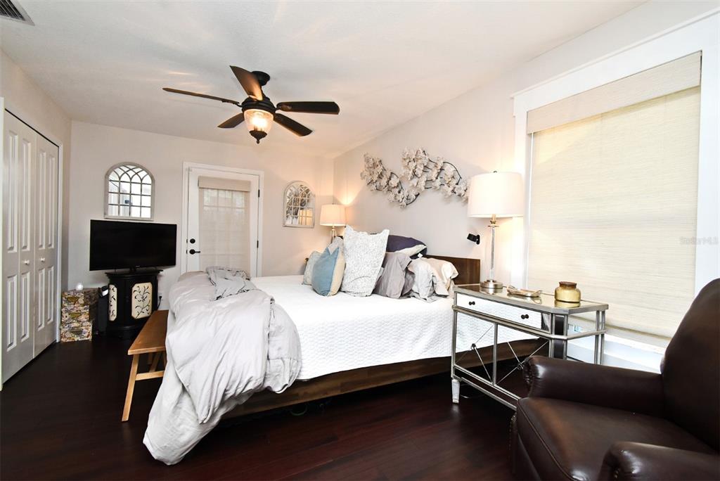 1312 2nd Street Edgewater, FL 32132 - Photo 21 of 41 a bedroom with a bed and a flat screen tv