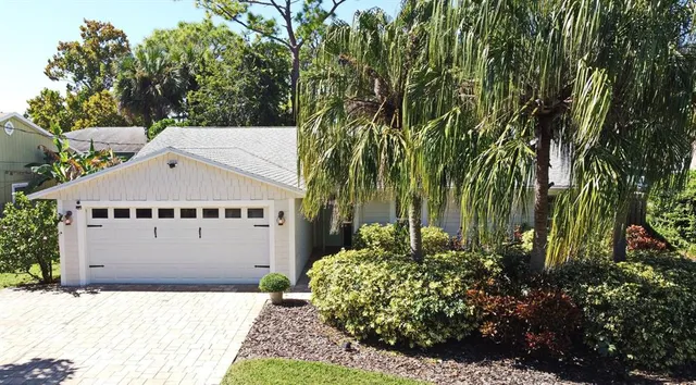front view of a house with a garden