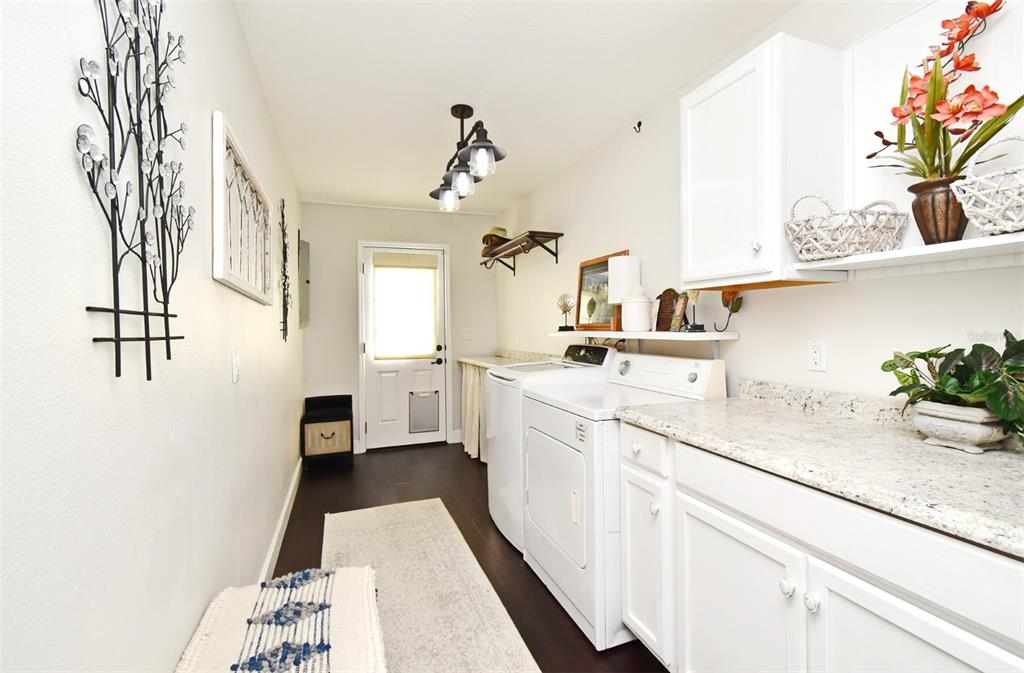 1312 2nd Street Edgewater, FL 32132 - Photo 31 of 41 a kitchen with a sink and cabinets