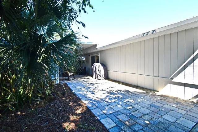 a view of backyard with green space