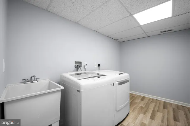 a utility room with dryer and washer