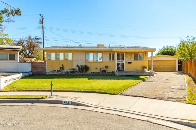 a view of a house with a swimming pool