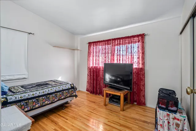 a bathroom with a sink vanity tub and shower