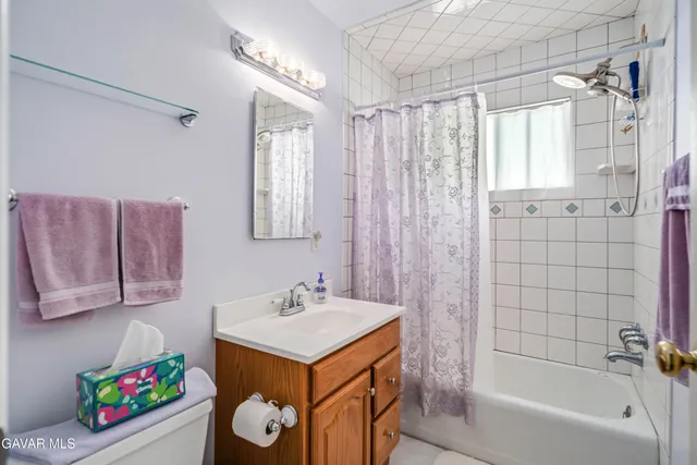 a view of a patio with swimming pool