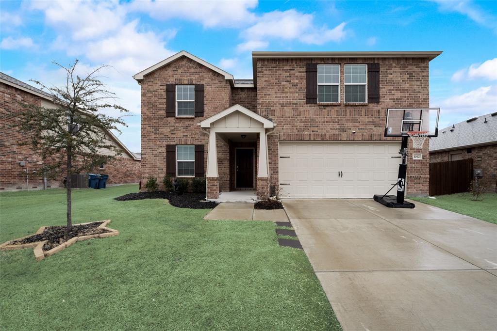 1012 Rio Frio Drive Forney, TX 75126 - Photo 1 of 1 front view of a house with a yard