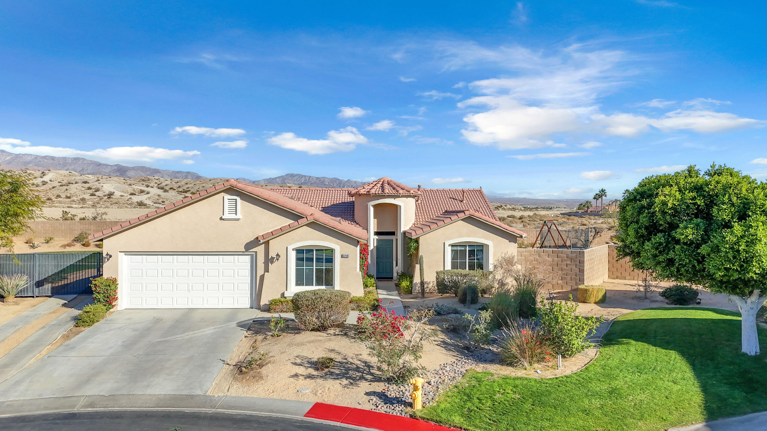 83480 Firecliff Court Indio, CA 92203 - Photo 24 of 61 a view of a yard in front of house