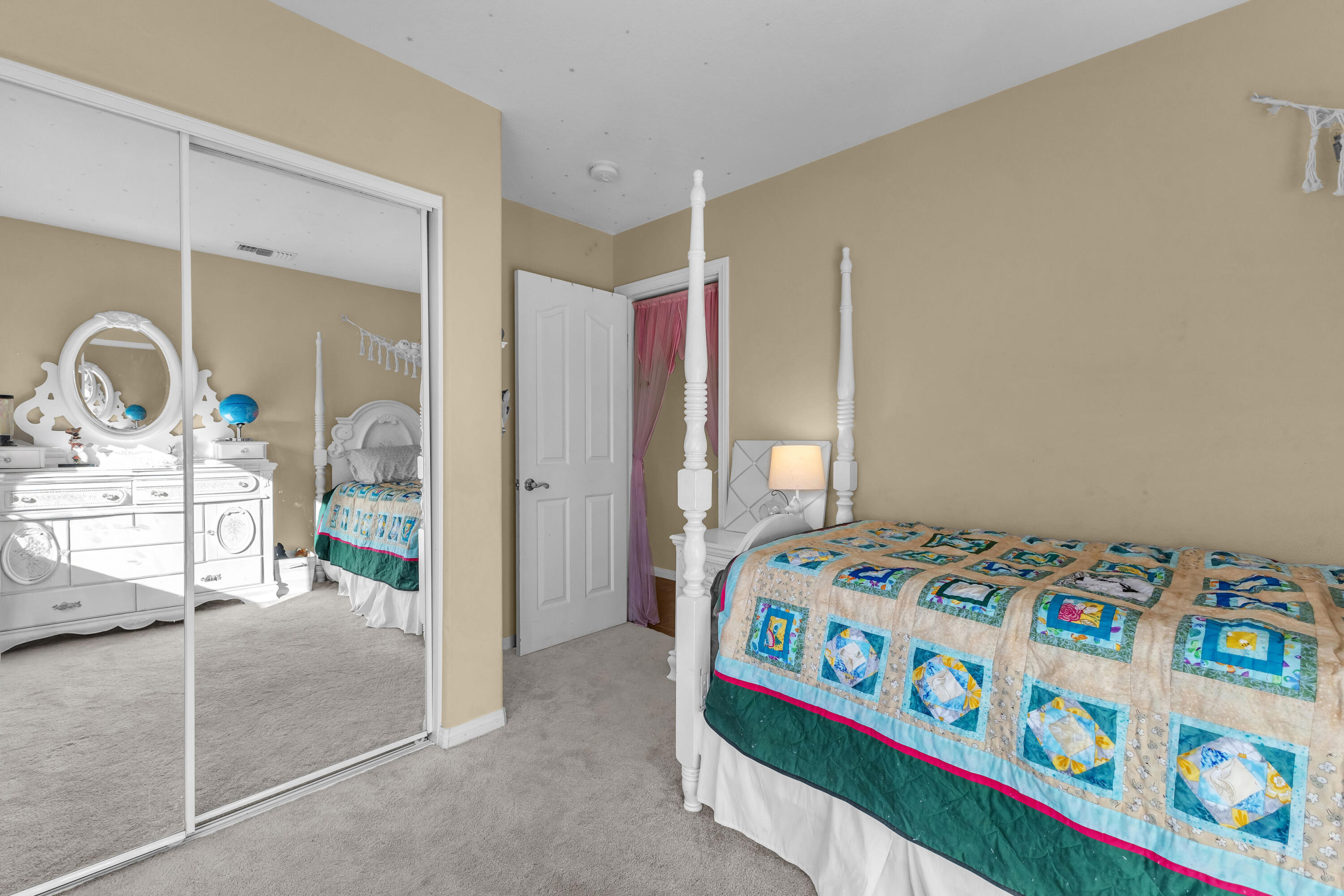 83480 Firecliff Court Indio, CA 92203 - Photo 35 of 61 a bedroom with a bed and a window