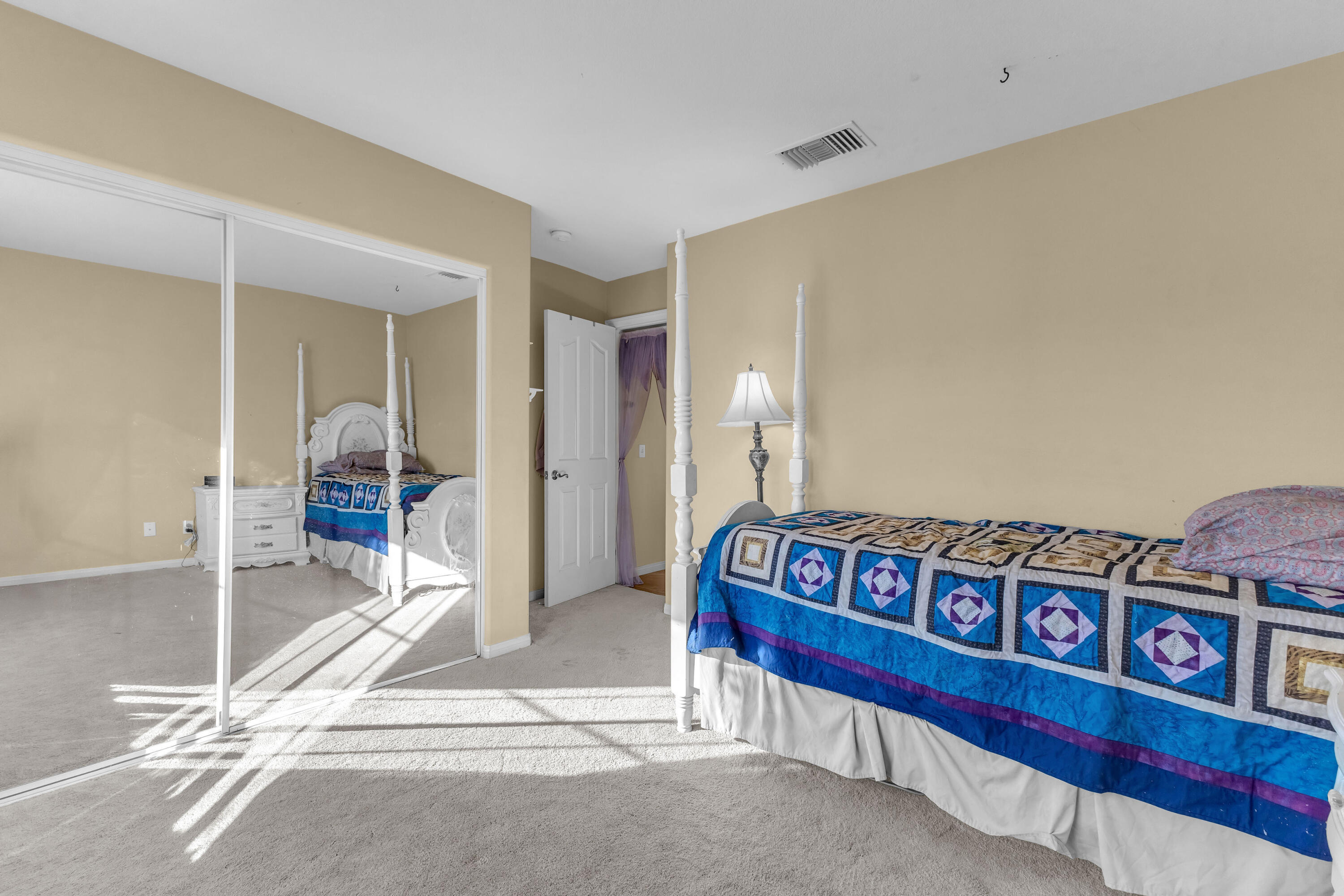 83480 Firecliff Court Indio, CA 92203 - Photo 37 of 61 a bedroom with furniture and a rug