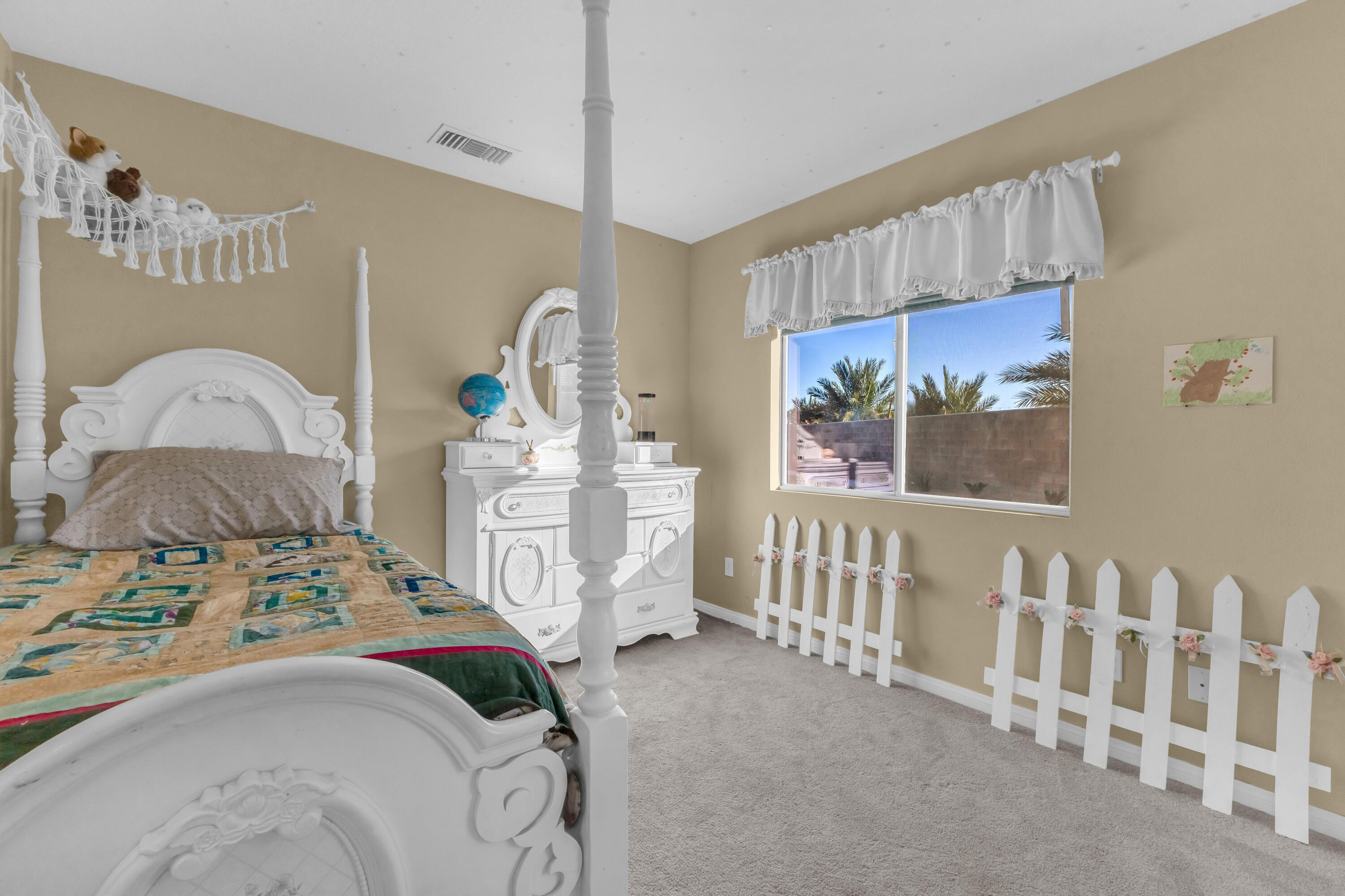 83480 Firecliff Court Indio, CA 92203 - Photo 10 of 61 a bedroom with a bed with window