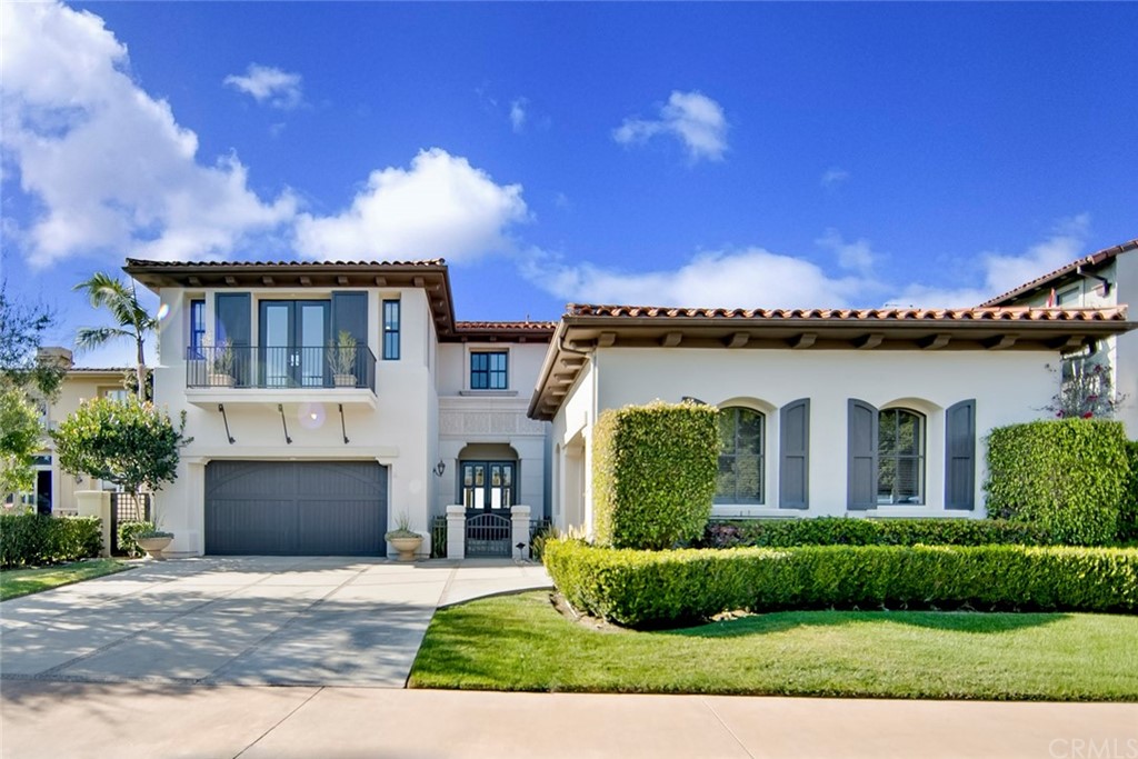 11 Vista Luci Newport Coast, CA 92657 - Photo 2 of 63 front view of a house with a garden
