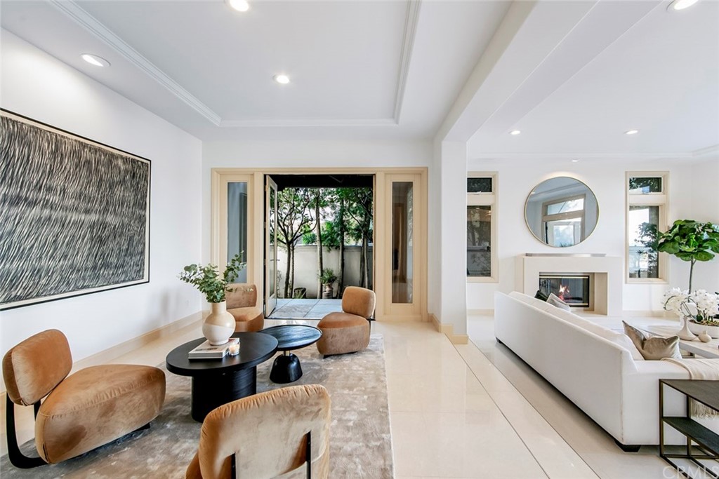 11 Vista Luci Newport Coast, CA 92657 - Photo 17 of 63 a living room with furniture mirror and a large window