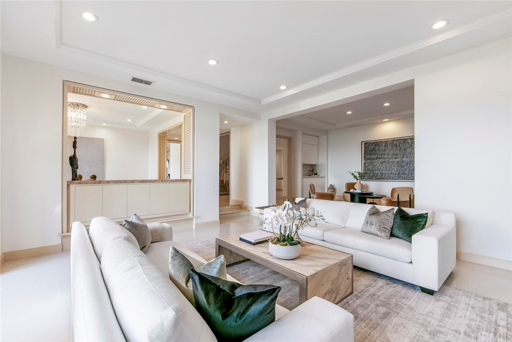 11 Vista Luci Newport Coast, CA 92657 - Photo 21 of 63 a living room with furniture and a wooden floor