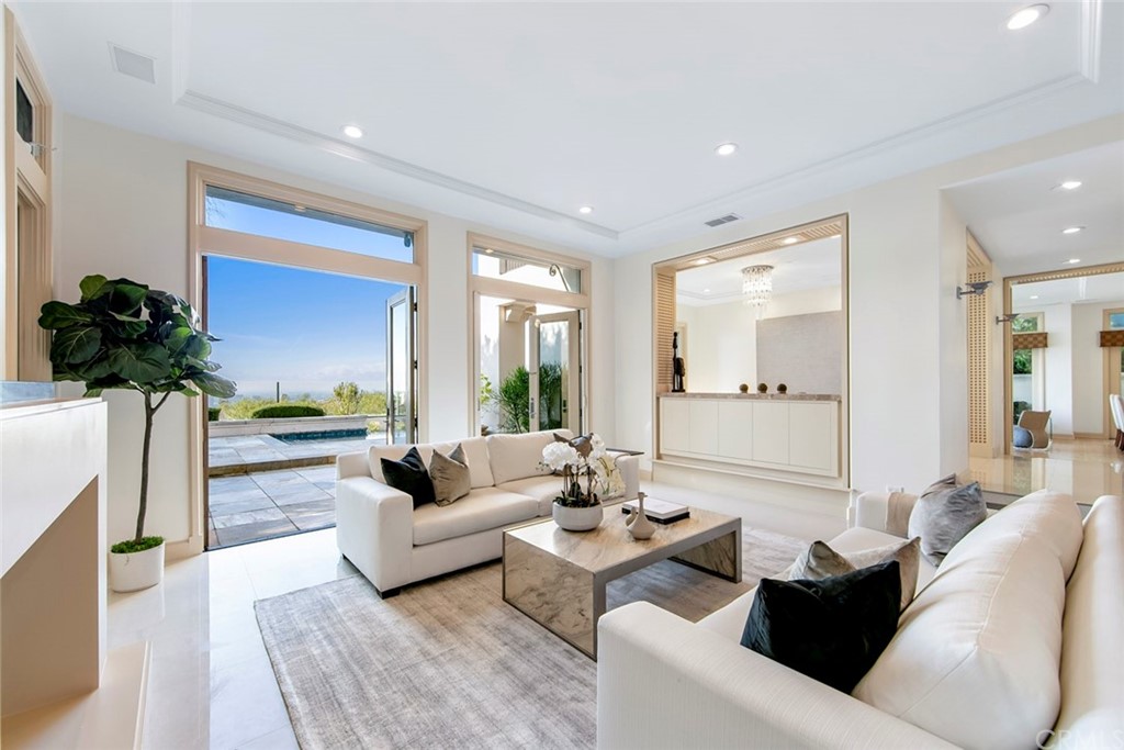 11 Vista Luci Newport Coast, CA 92657 - Photo 23 of 63 a living room with furniture and a large window