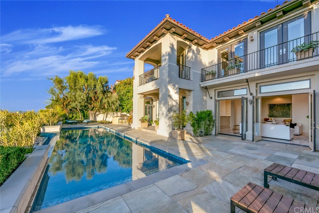 11 Vista Luci Newport Coast, CA 92657 - Photo 29 of 63 a front view of a house with a yard