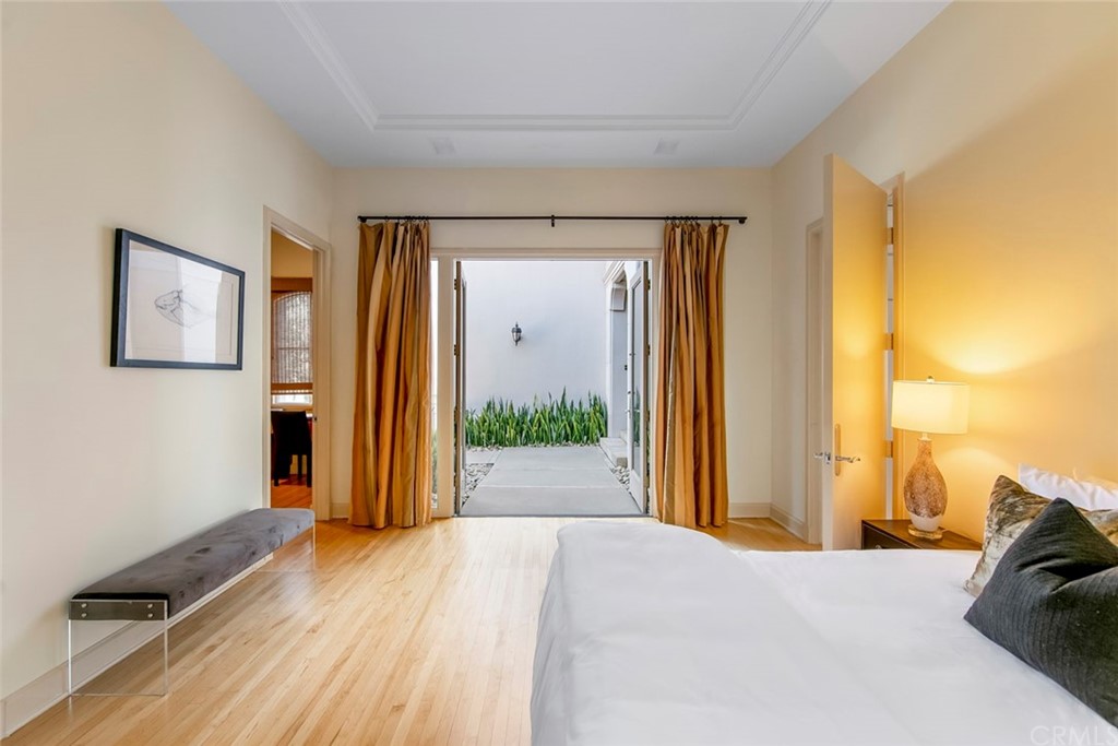 11 Vista Luci Newport Coast, CA 92657 - Photo 45 of 63 a bedroom with a bed and a window