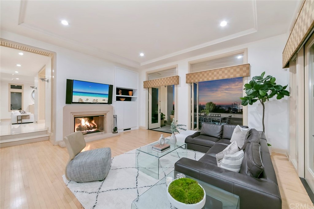 11 Vista Luci Newport Coast, CA 92657 - Photo 51 of 63 a living room with furniture and a flat screen tv