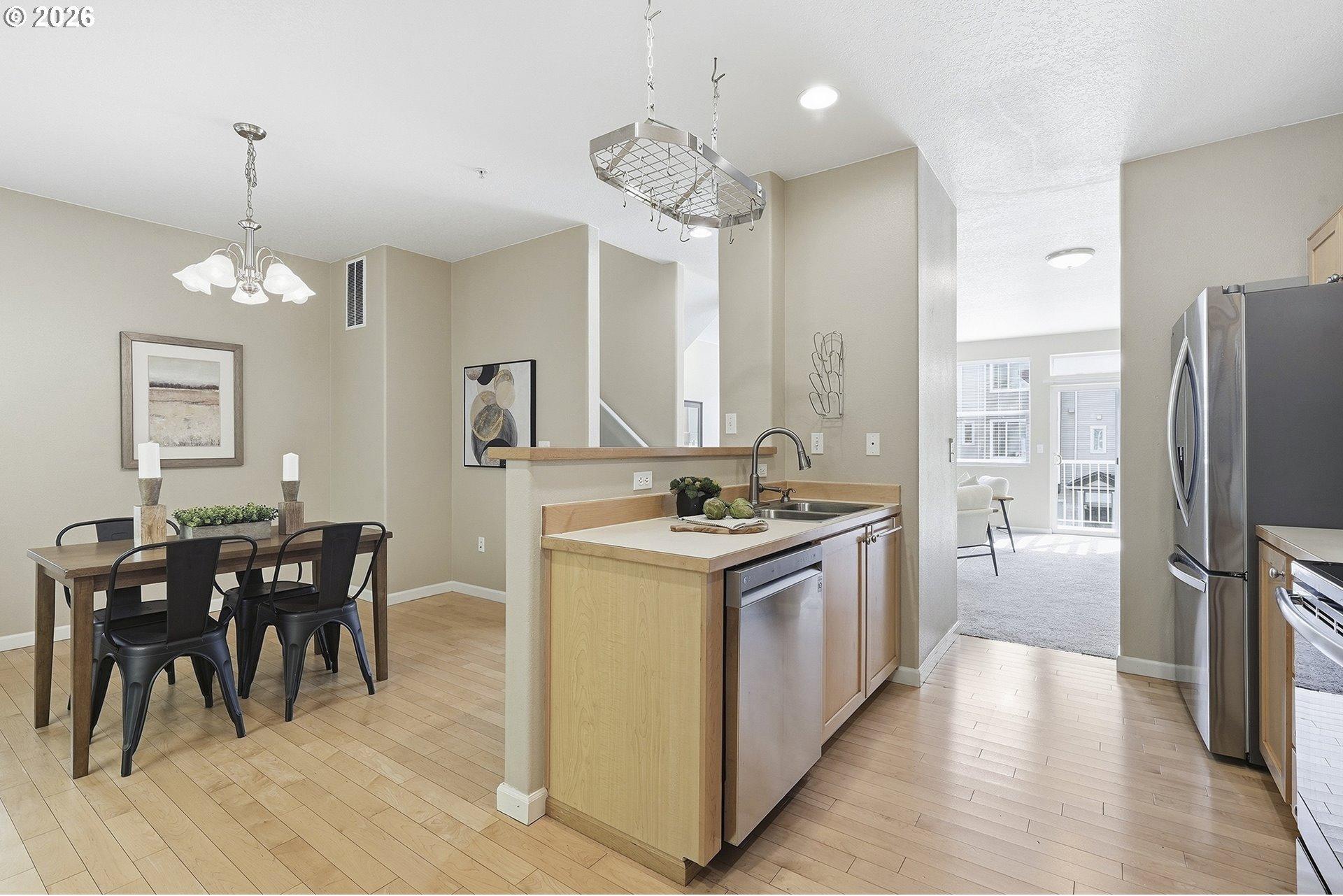 15430 Southwest Sparrow Loop, Unit 105 Beaverton, OR 97007 - Photo 19 of 43 Kitchen/Dining Room