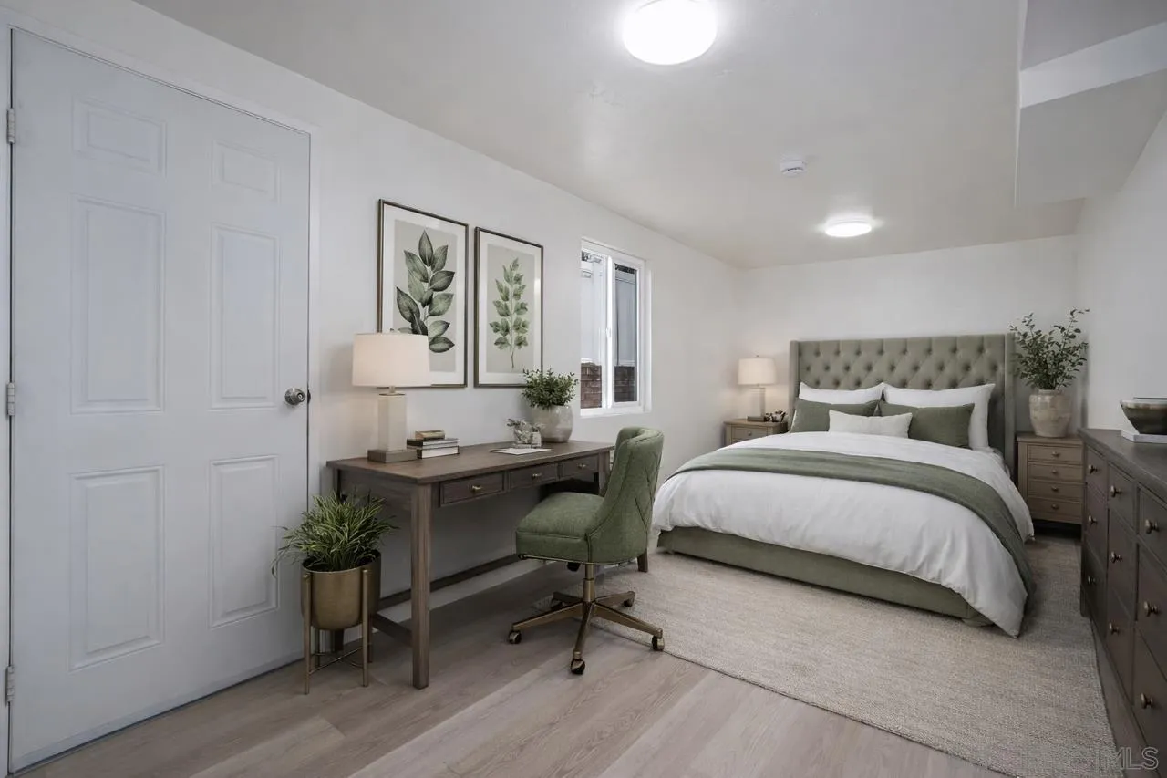 9213 Fenway Road Santee, CA 92071 - Photo 20 of 25 a bedroom with a bed and a workspace