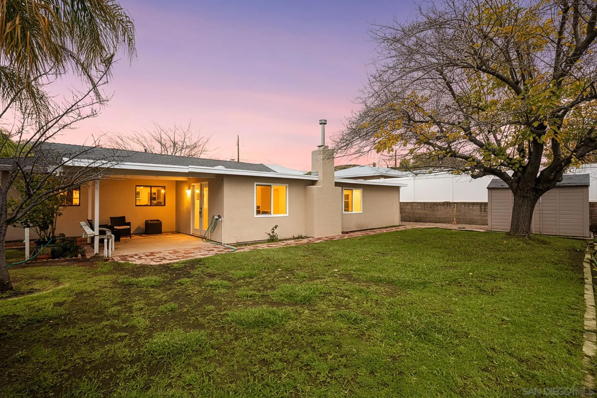 9213 Fenway Road Santee, CA 92071 - Photo 22 of 25 a view of a house with a yard