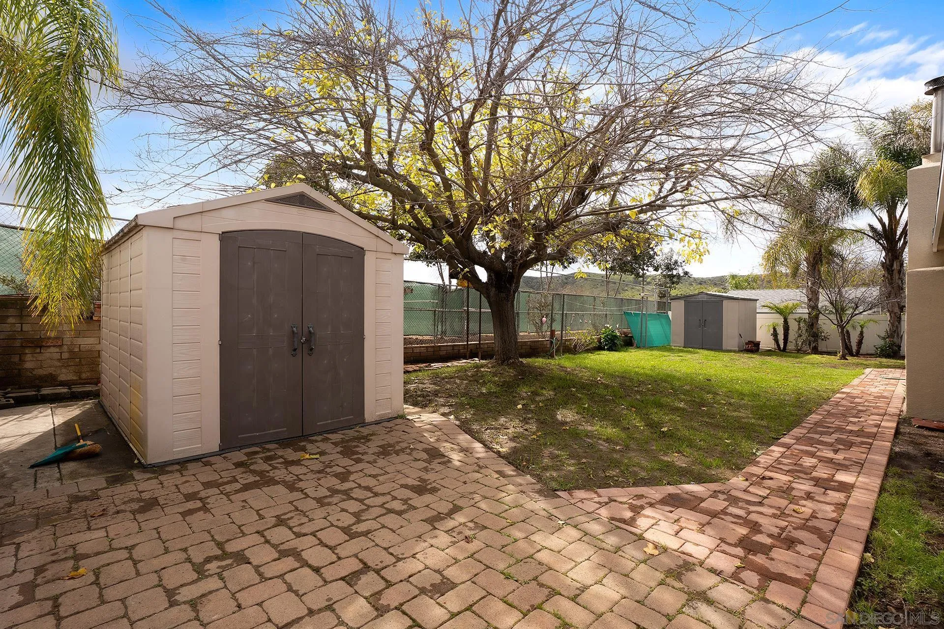 9213 Fenway Road Santee, CA 92071 - Photo 25 of 25 a view of a house with a yard