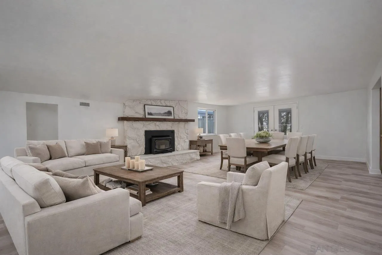 9213 Fenway Road Santee, CA 92071 - Photo 10 of 25 a living room with furniture and a fireplace
