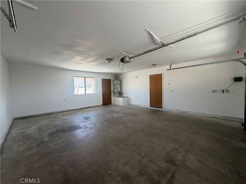 19609 Seneca Road Apple Valley, CA 92307 - Photo 36 of 37 a view of empty room with windows