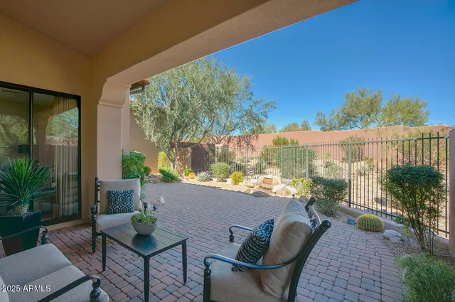 a view of balcony with furniture