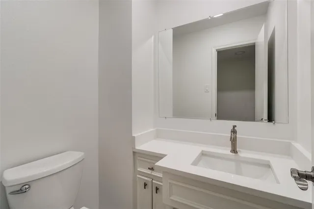 a bathroom with a sink and a vanity