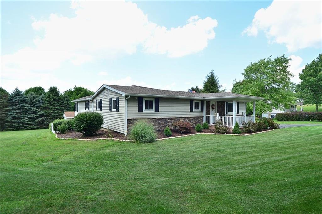 This Lovely COUNTRY RANCH home w/ 1 acre property is minutes from Rtes 19 & I79 , Zellienople & Cranberry.