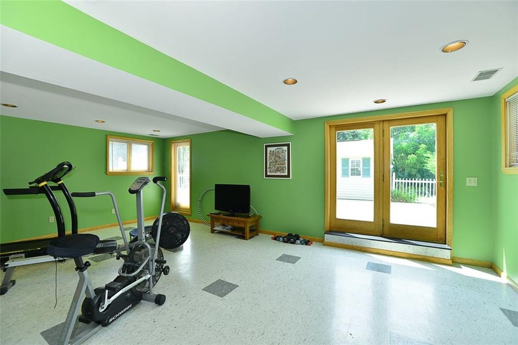462 Scott Ridge Road Harmony, PA 16037 - Photo 21 of 25 The LOWER LEVEL of this spacious home just adds to the excitement of having room to enjoy. This GAME ROOM/FAMILY ROOM is an expansive space w/ recessed overhead lighting & (2) large storage closets.