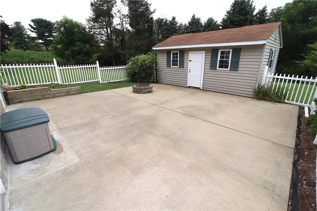 462 Scott Ridge Road Harmony, PA 16037 - Photo 23 of 25 Enter this LOWER LEVEL EXPANSIVE concrete patio area accessed by the LL Family Room or the Elevated Deck area. Perfect for moments of quiet or larger group entertaining!