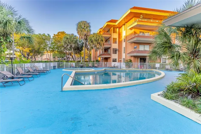 a view of a house with a swimming pool