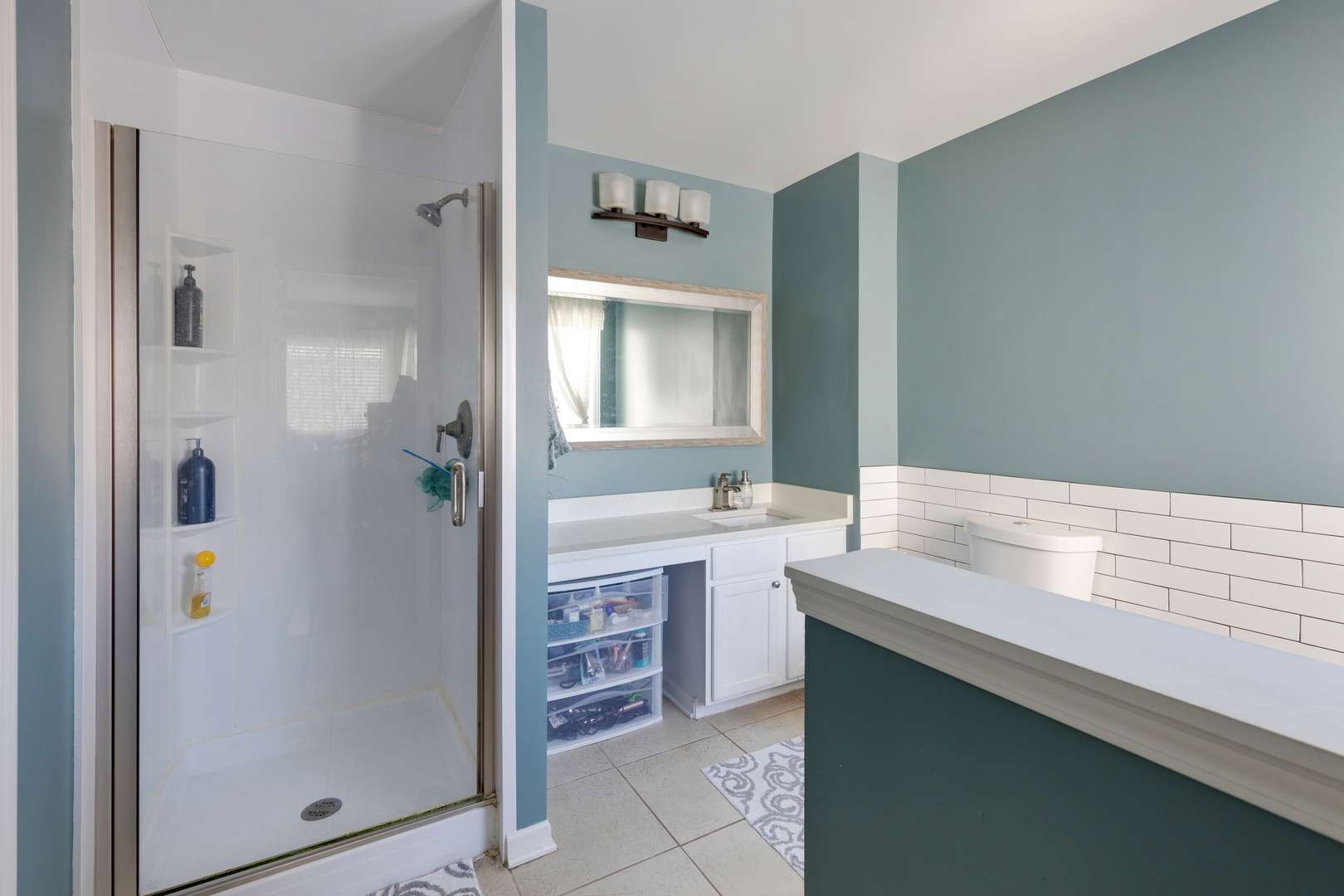 1 Carl Court Lake In The Hills, IL 60156 - Photo 11 of 20 a bathroom with a sink and a mirror